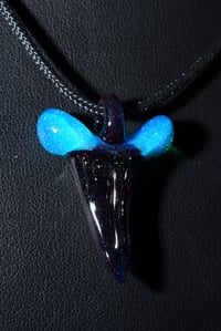 Image 1 of Fully crushed opal glass shark tooth pendant..