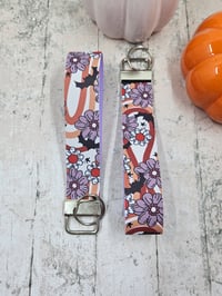 Image 4 of Retro Batty Flower Wristlet Keychain