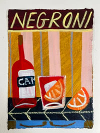 Negroni on chartreuse and pink stripes with oranges 