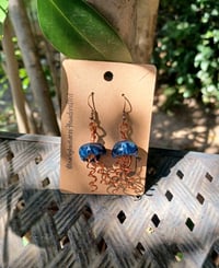 Image 3 of Dark blue and copper jellyfish
