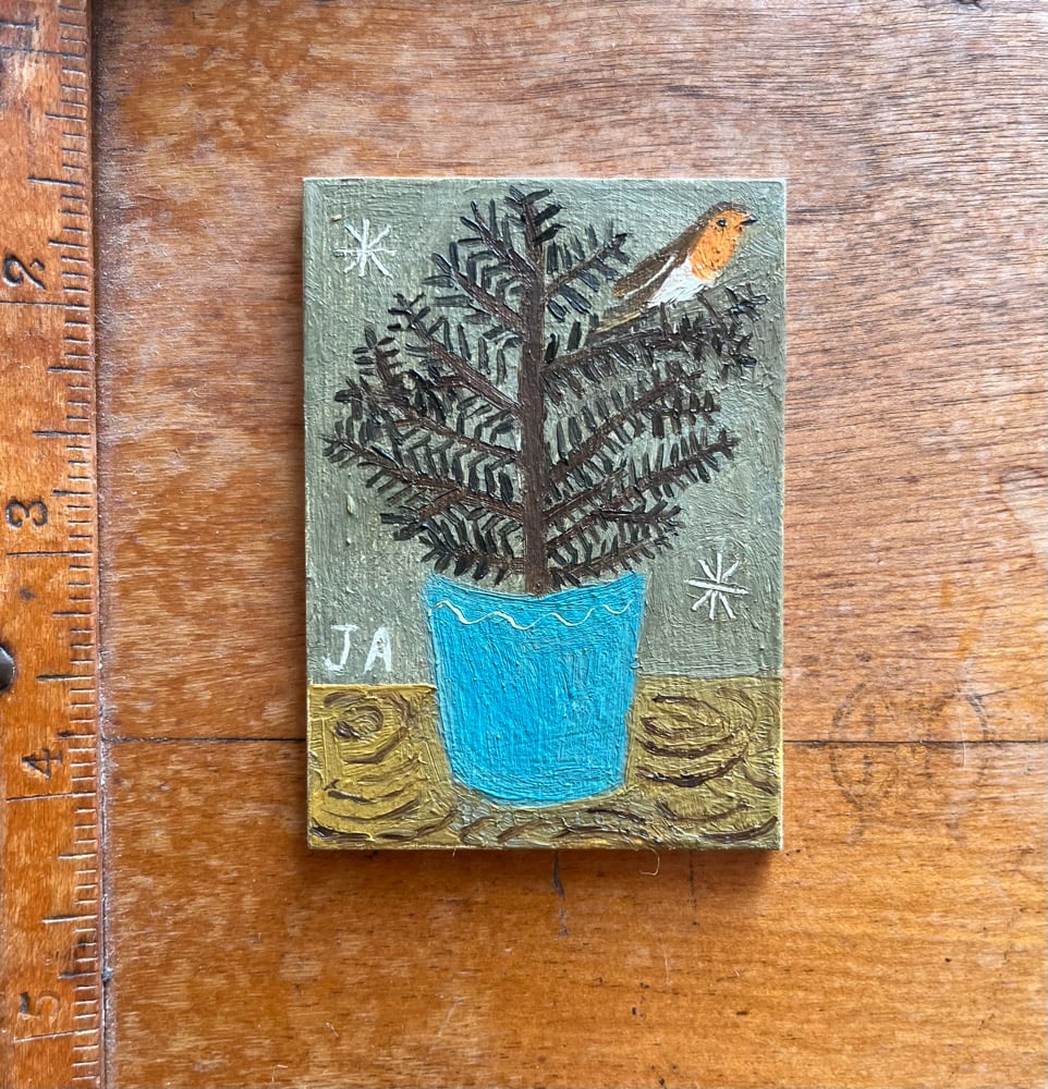 Image of Little tree and robin 
