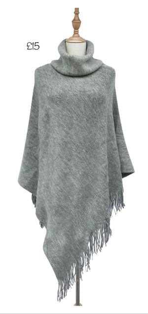 Image of Poncho - High Roll Neck Plain Tassel Knitted Poncho