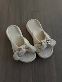  cream bow sandals (sz 8)