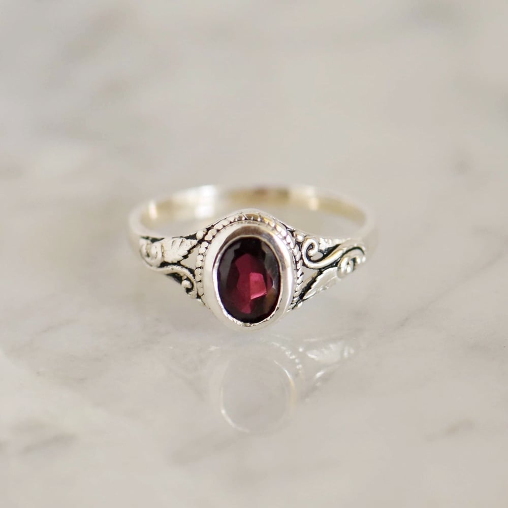 Image of Red Garnet oval cut vintage style silver ring