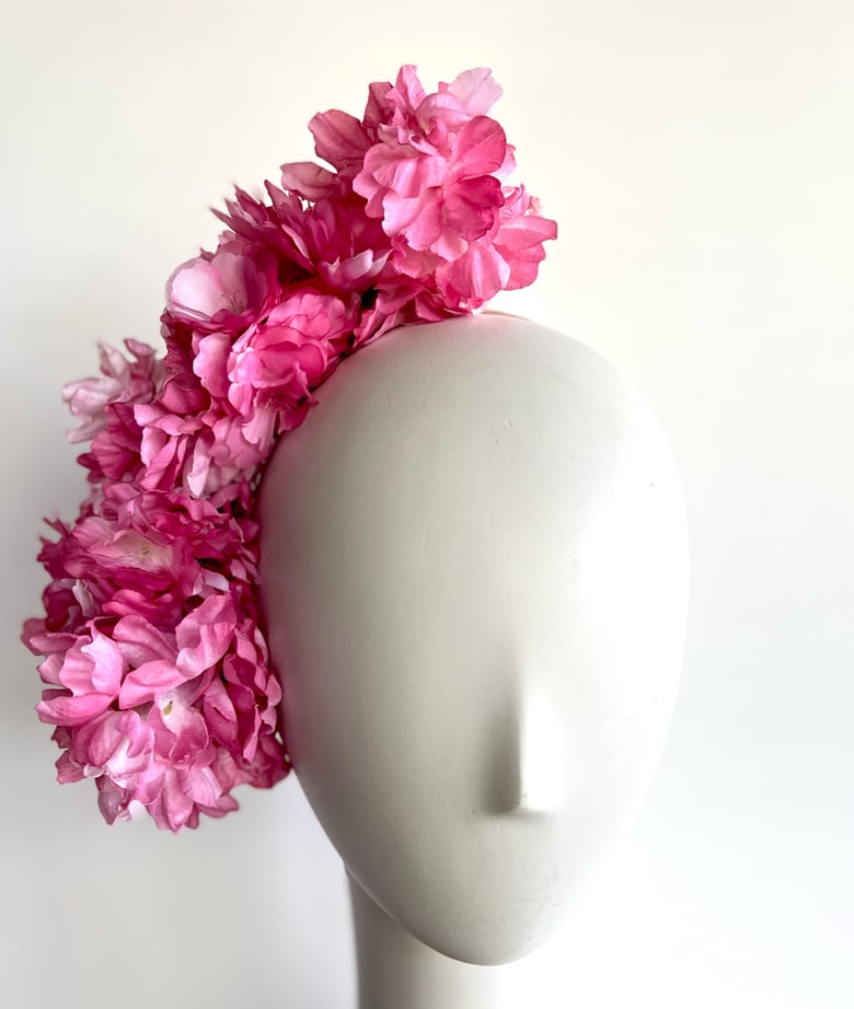 Image of Rose pink flower headpiece. 