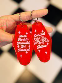 Image 3 of Florida motel keychains