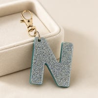 Image 8 of Light Blue Glow Letter Keychain • Personalized Resin Charm
