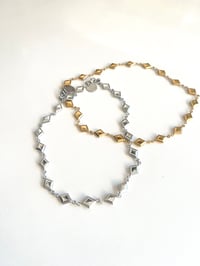 Image 1 of Gold VS Silver Diamond