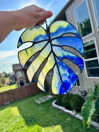 Image 1 of Stained-Glass Monstera Leaf Suncatcher - Blue & Green Tropical Window Hanging Art Decor