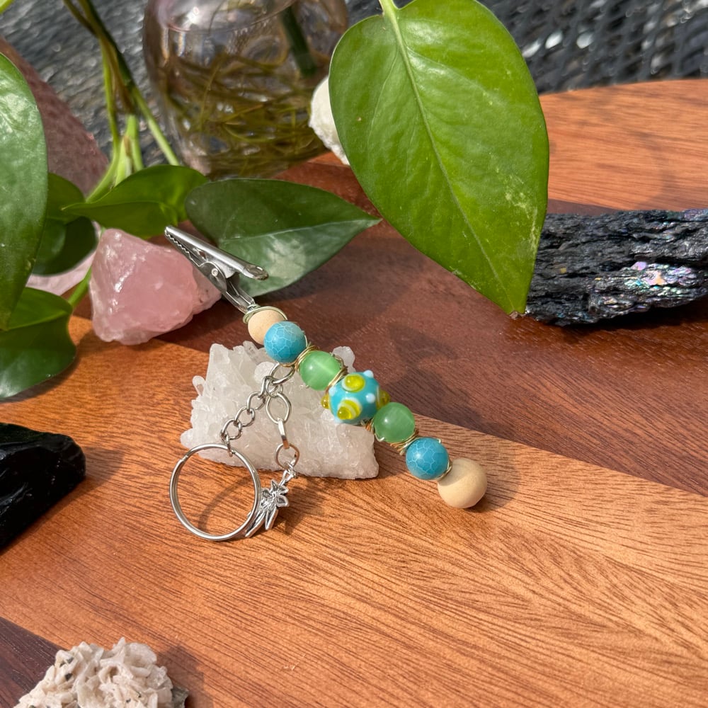 Image of teal terp clip keychain