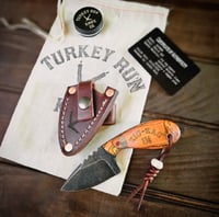 Image 1 of SKINNER • zig-zag orange