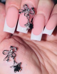 Image 1 of Bow star dangles 