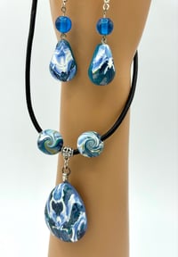 Image 2 of Polymer clay pendant on leather cord