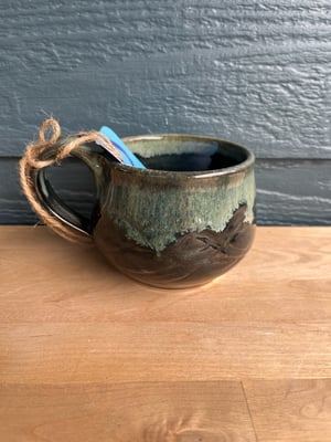 Image of M44 small mug with dark speckled glaze, round belly