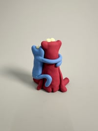 Image 4 of Blue thing hugging a red thing