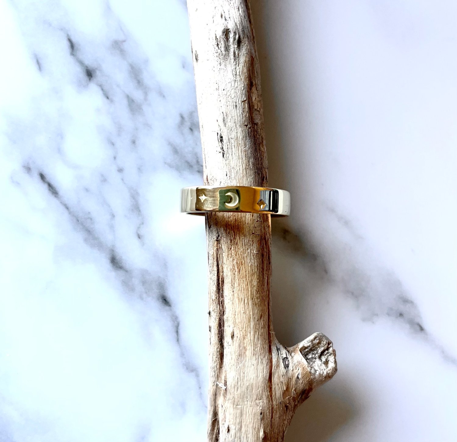 Image of Celestial 18ct Gold Wedding Ring Crescent Moon Stamp Detail. Cosmic Moon Gold Wedding Band Stamped