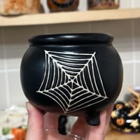 Image 1 of cedar and spruce scented cauldron candle