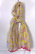 Image of yellow and pink flower shawl with crocheted ends