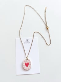 Collier pendentif cœur explosif céramique