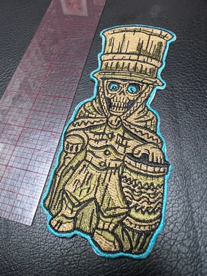 Image of 6” Hat Box Ghost Tiki Mug patch with iron on backing