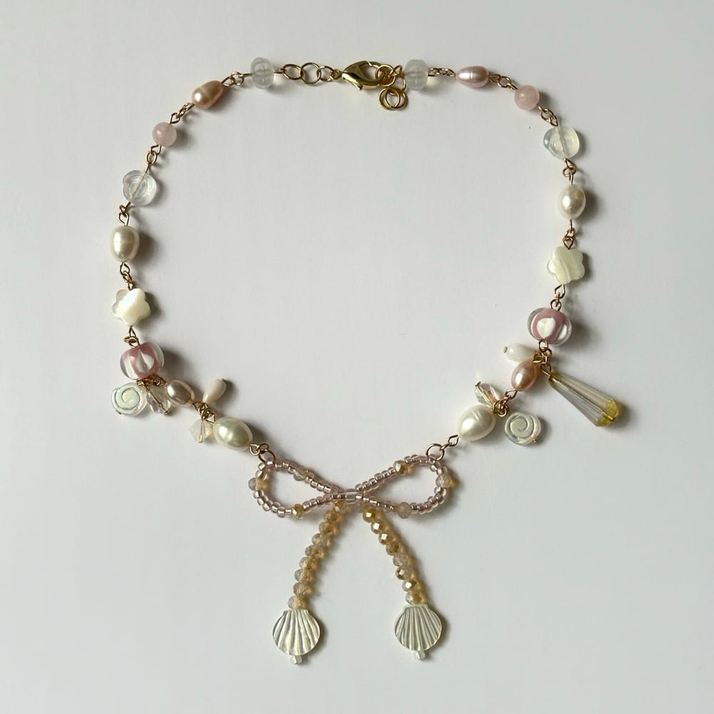 Image of mother of pearl bow