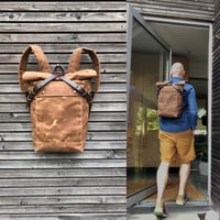 Image 1 of Waterproof backpack medium size rucksack in waxed canvas, with volume front pocket and double layere