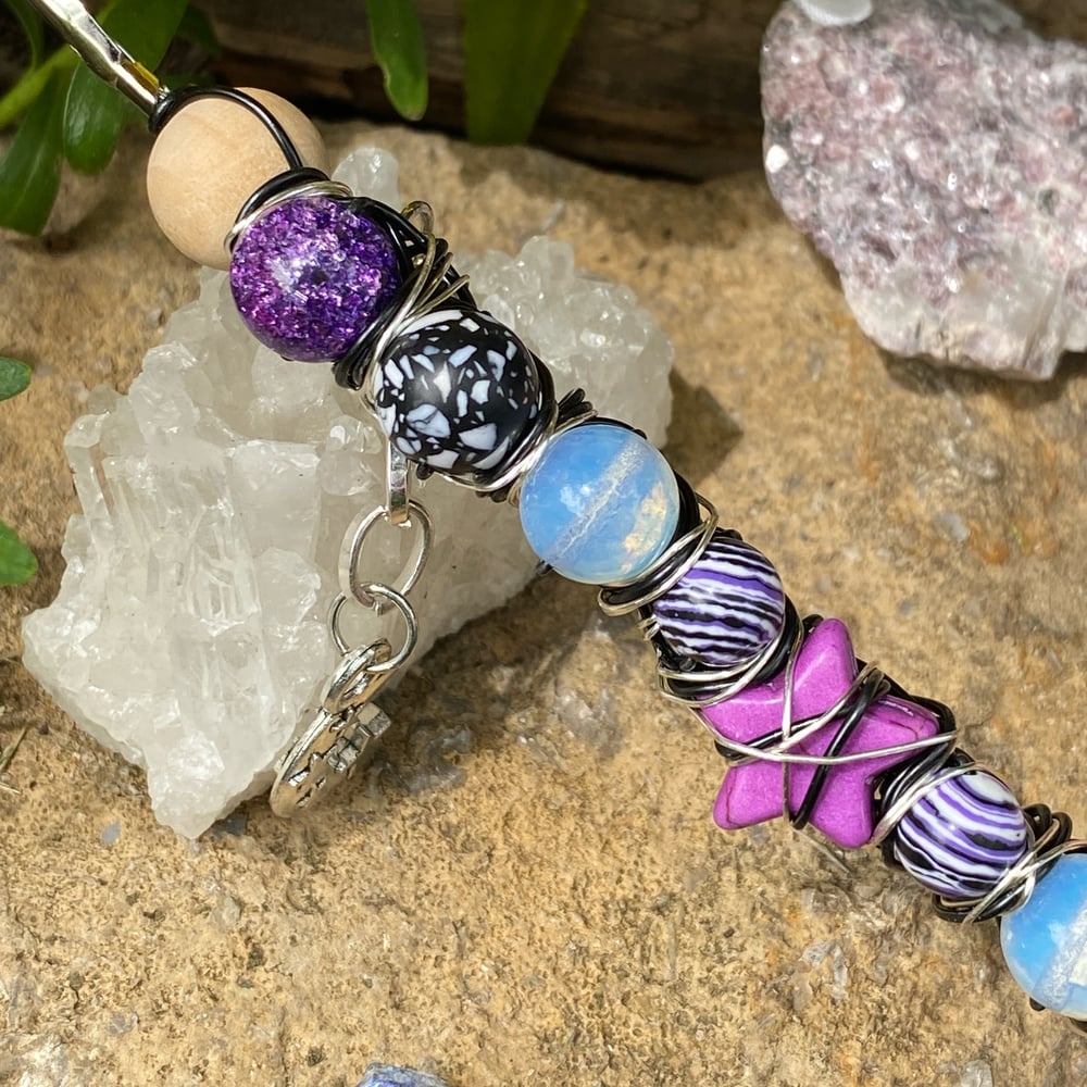 Image of purple shooting star roach clip