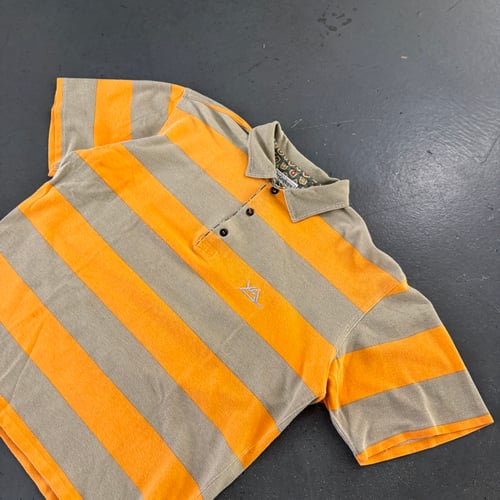 Image of 1980s YSL polo shirt, size small 