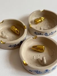 Image 1 of Golden Tooth Ashtray 