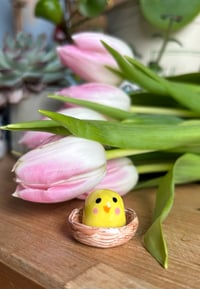 Image 1 of Ceramic Pink Cheek Chick in a basket
