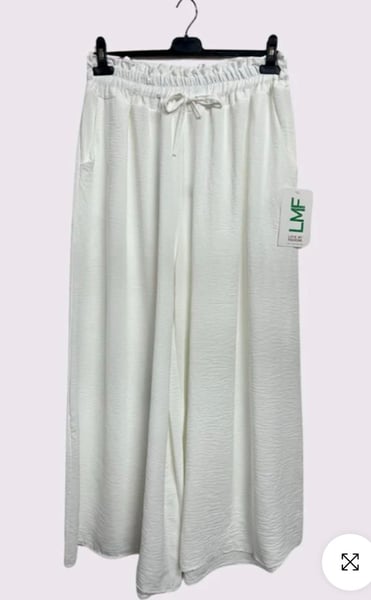 Image of Plain Side Pockets Wide Legs Trousers