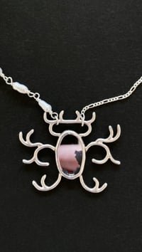 Image 2 of Miroir piqué