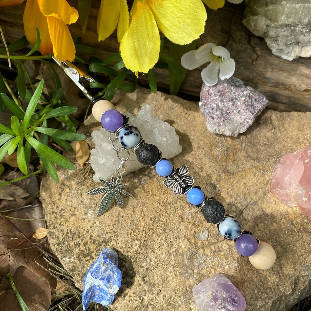 Image of midnight butterfly roach clip
