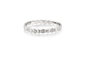 Image of seed band with diamond accents