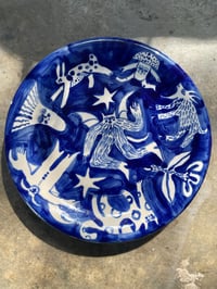 Dancing - 29cm plate with some disadvatage clay on bottom 