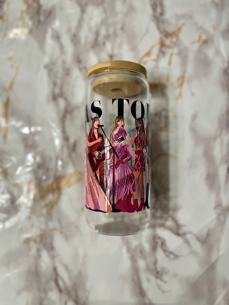 https://assets.bigcartel.com/product_images/885c1452-0318-41d4-851c-a1aefbaafa8a/the-eras-tour-taylor-swift-lovers-beer-can-glass-20oz-tumbler.jpg?auto=format&fit=max&w=800