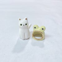 Image 3 of white cat with frog hat ceramic figurine