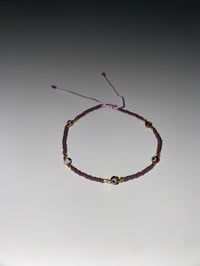 Image 1 of Purple multi evil eye bracelet 