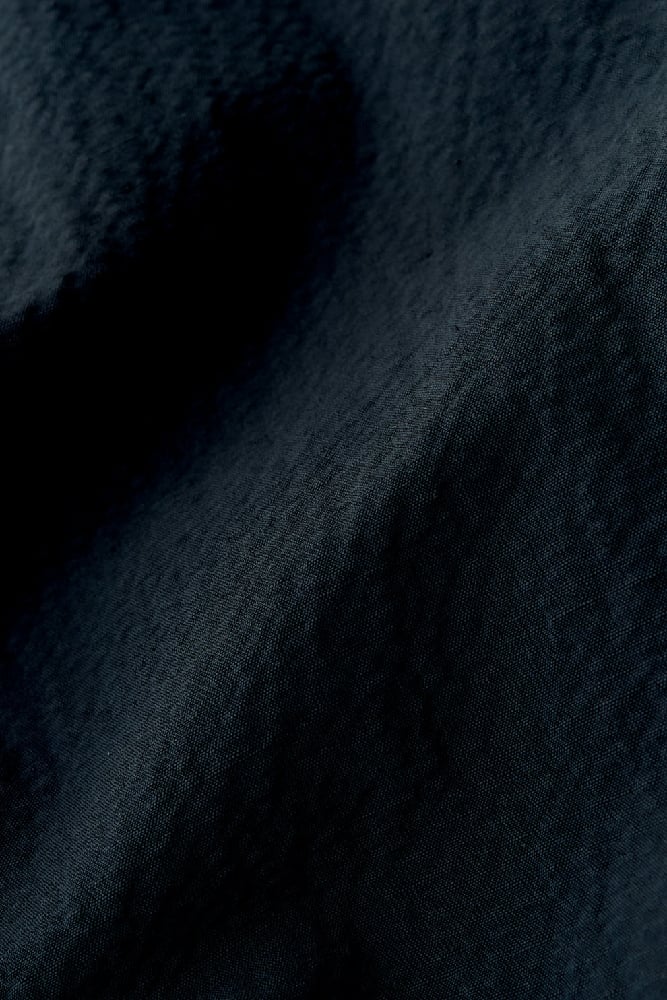 Image of A KIND OF GUISE FOLDED WIDE TROUSERS DARK INCENSE