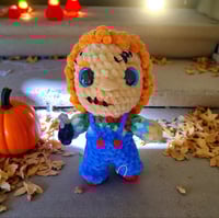 Image 1 of Menesing Doll 