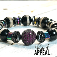 Image 1 of Tibetan Hematite Splash