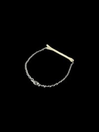 Image 2 of feral cat bone bracelet 