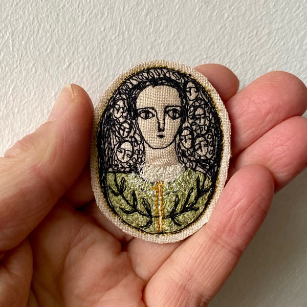 Image of Portrait of a woman in green - smaller embroidery brooch