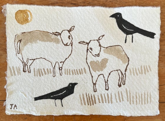 Image of Two sheep and two crows