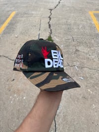 Image 1 of evil dead camo hat