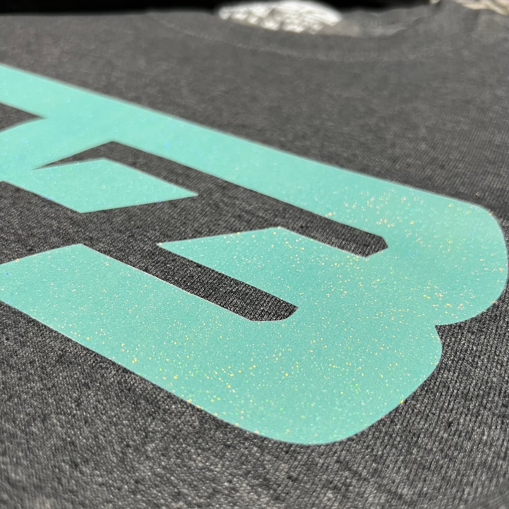 Sparkling Teal On Dark Grey Hoodie/Crewneck