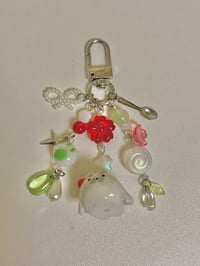 Image 3 of melon soda seal clay keychain