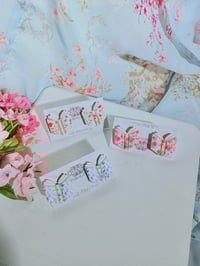 Image 1 of Floral Book Studs 