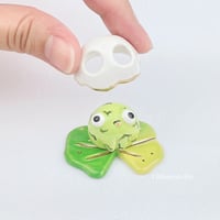 Image 3 of Sad zombie frog on lily pad with ghost mask ceramic figurine 