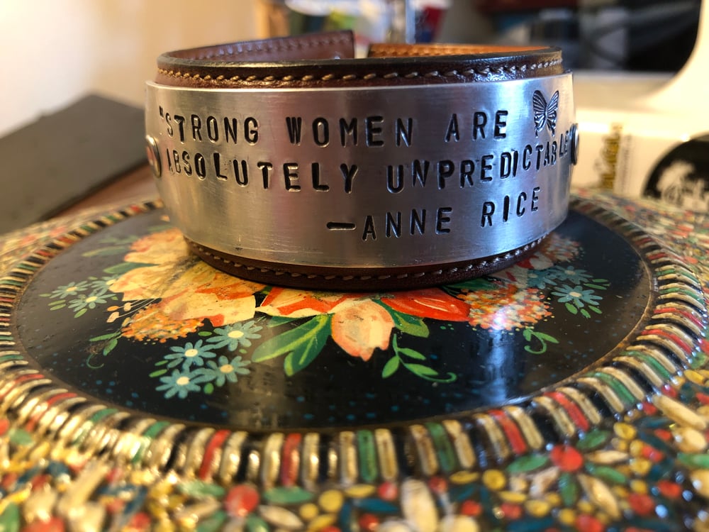 Upcycled and reclaimed “Quoteables” leather cuffs